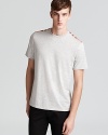 Check shoulder panels demonstrate your taste for high fashion in this super-soft tee from Burberry Brit.