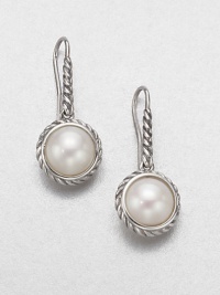 Luminous pearl drops, suspended from and framed by sterling silver cables. White pearls Sterling silver Drop, about ½ Ear wire Imported