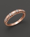 Diamonds dot a 14K rose gold band.