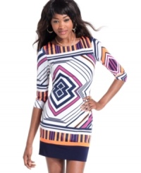 This sheath dress from Baby Phat commands all attention with its colorful geometric print and alluring back cutout. (Clearance)