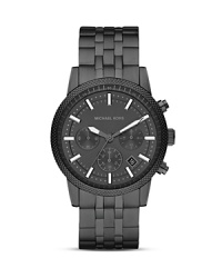 Hard-hitting and handsome, this Michael Kors watch puts a luxury spin on surplus style, crafted from stainless steel.