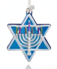 Have a happy and a merry with the Star of David ornament, featuring a silver menorah with colorful candles from Kurt Adler.