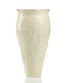 With lush roses and delicate dots carved in ivory porcelain, this classic vase offers a fine setting for fresh bouquets. A scalloped, gold-tipped rim adds an element of grandeur to every arrangement.