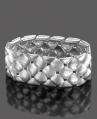 Add easy style to your outfit with this luminous open-cut silvertone mixed metal bracelet that slips on and off gracefully. Measures approximately 1 inch wide and 2-1-2 inches in diameter.