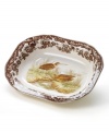 Bring the classic style of the English countryside to your table with the Woodland Collection by Spode. This traditionally patterned open vegetable bowl features the majestic snipe framed by Spode's distinctive British Flowers border which dates back to 1828.