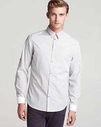 Maintain a sharp look with a stripe button-down tailored for a slim fit and crafted in cotton for a soft hand.