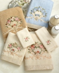 Add an elegant dash of English grace to your powder room with Avanti Rosefan hand towels. Embroidered with a delicate flower design and finished with a textured jacquard border.