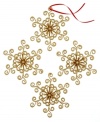 Swirl away. Give your tree that extra-special glimmer with the luminous golden sparkles and sweet design of these Swirl Snowflake ornaments.