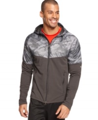 Look fly in this camo top hoodie by Nike with reflective strips to get you noticed.