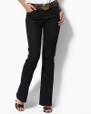 These straight-leg jeans are designed in stretch cotton denim for comfort and a flattering fit. Moderate low-rise waist, sleek hip. Zip fly with shank closure. Five-pocket style with metal rivets at points of wear. Back right pocket features the signature LRL embroidered logo. Leather logo patch accents the back waist. Inseam, about 29.