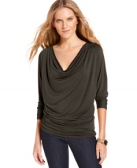 A slinky petite cowlneck top from MICHAEL Michael Kors embodies both versatility and romance in a softly draped silhouette. Wear it with your favorite jeans for classic style or give it an extra pop with bright colored denim.