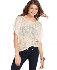 A loose silhouette and splattered metallic print bring casual-glam style to an effortless day top! From Dolled Up.