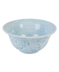 Sculpted blooms and a classic silhouette make the Toulouse cereal bowl by Fitz and Floyd a charming part of any casual landscape. A rustic sky-blue glaze adds to its antique appeal.