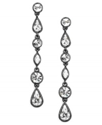 Lengthen your sophisticated look. Givenchy's light hematite-plated mixed metal earrings feature stunning crystal glass stones. Approximate drop: 3-3/4 inches.