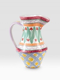 A handcrafted ceramic design inspired by a trip to a Dutch tulip market is individually painted by master ceramics artisans in an array blossoms and bold lines. For an especially one-of-a kind touch, each piece bears the hand-placed stamps of the artisans who created it. Dishwasher- and microwave-safe Six-ounce capacity 10H X 6¼ diam. Made in USA