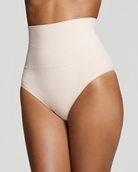 A contour thong shapewear that visibly slims and smoothes the tummy for a sleek silhouette. Style #1352