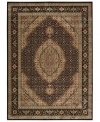 Distinctive flair with roots in Persian design. This exquisitely ornate area rug is abound in deep, striking black and beige tones, highlighted by a dramatic central medallion, and crafted from Nourison's own Opulon™ yarns for a densely woven pile with long-lasting color retention and durability.