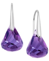 Amazing amethysts. Purple reigns in this pair of drop earrings from Swarovski. Crafted from rhodium-plated mixed metal and featuring stunning amethysts offset with crystal accents, this set is a thing of beauty. Approximate drop: 1-1/10 inches.