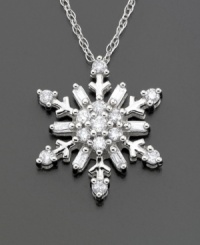 Round-cut and baguette-cut diamonds (1/5 ct. t.w.) make this snowflake shape glitter like fresh snow. Set in 14k white gold. Chain measures 16 inches.