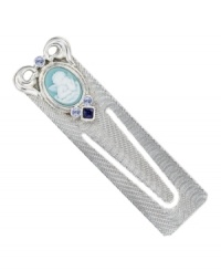 The perfect gift for the ultimate bookworm. This sentimental piece by Vatican features a blue enamel, cameo angel accented by sparkling light blue and Montana crystals. Crafted in silver tone mixed metal. Approximate length: 3 inches.