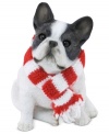 A fetching gift for animal lovers, the French Bulldog Christmas ornament depicts the beloved black and white pup waiting patiently for treats and dressed in a holiday scarf. From Sandicast.