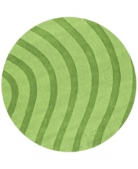 Abstract and absorbing, this unique rug adds movement to any room. Playful, wavy lines reverberate against a forest-green ground, resounding with personality in your home.