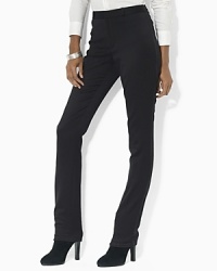 Sleek and stylish in an indulgent stretch wool-and-satin construction, this versatile pant presents a feminine play on the traditional menswear staple with dapper tuxedo striping at the outer leg.