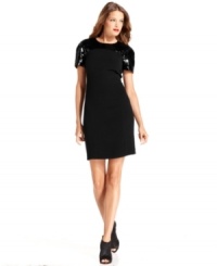 MICHAEL Michael Kors' little black dress shimmers with striking sequined detail at the shoulders.