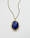 A beautiful, speckled lapis cabochon set in sterling silver and 24k gold on a link chain. LapisSterling silver24k goldLength, about 17.7Pendant size, about 1.2Lobster clasp closureImported 