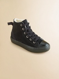 Classic Chuck Taylors in ultra-soft suede with cozy, faux shearling lining in a must-have high-top silhouette.Lace-up closureLeather upperFaux shearling liningRubber solePadded insoleImported