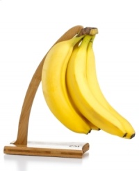 Hanging in there! Add a classic touch to your countertop with an attractive bamboo banana hanger, which puts your produce on display, keeping bananas fresh and promoting even ripening. Limited lifetime warranty.