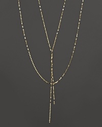 This twisted, glittering gold chain is perfect for adding delicate drama to any look. From Lana.