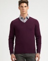 Slim-fitting, extra-fine virgin wool sweater with contrast color detail at inside collar trim.V-neckRibbed knit cuffs and hemWoolDry cleanImported