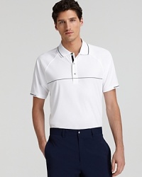 Ready for the golf course or the pool party, this sport-smart polo from Zero Restriction is zipped up with thin contrast stripes and raglan sleeves.