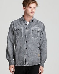 Though neutral in tone, this button-down from PRPS Goods & Co. jazzes up your relaxed wardrobe with an exciting design.