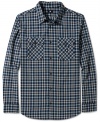 Add checks to your wardrobe and you'll get checked out with style in this shirt by DC Shoes.