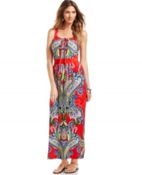 Bold and exotic, NY Collection's maxi dress channels the spirit of summer with its bright, colorful paisley print. At the neckline, a stylish tie adds the perfect finishing touch.