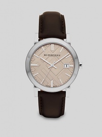 A sleek, sophisticated design set in stainless steel with leather strap and check-inspired dial.Round bezelQuartz movementWater resistant to 5ATMDate function at 3 o'clockSecond handStainless steel case: 38mm(1.49)Leather strapMade in Switzerland