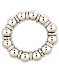 Have yourself a ball. Nine West offers this stretch bracelet crafted from silver tone mixed metal and featuring a range of understated accents. Approximate diameter: 2 inches.