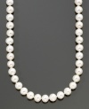 Complement her good taste with this classic style. Belle de Mer's traditional design features an elegant strand of cultured freshwater pearls (6-7mm) set in 14k gold. Approximate length: 18 inches.