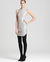 Lavished with sparkling silver sequins, this statuesque Dolve Vita dress, shimmers, glimmers and shines!