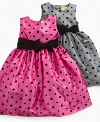 Dot her dainty looks with this sweet velvet polka dot dress from Penelope Mack.