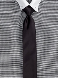 An elegant rendition of a simple necktie, rendered in a luxurious stretch cotton blend.About 2½ wide59% cotton/37% polyester/4% elastaneDry cleanMade in Italy