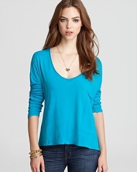 Pair this brightly-hued ALTERNATIVE tee with your everyday blues for a colorful, casual ensemble.