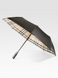 This walking umbrella offers a shiny-sleek look and ample coverage from the elements.Automatic openOpen diameter, about 47Folded length, about 37PolyesterImported