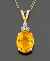 Oval-cut citrine( 2.2 ct. t.w.) crowned with diamond accents and mounted in polished 14k gold. Chain measures 18 inches.