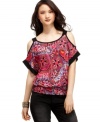 Brighten up your day ensemble with this cutout top from BCX featured in a brilliant, printed fabric!