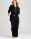 With an ornate logo and contrast trim, Lauren Ralph Lauren's classic pajama set will tempt you to show off outside the bedroom.