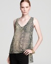 Ever-chic snake print adorns this breezy Aqua top, flaunting an on-trend high-low hemline.