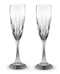 The resplendent crystal and quintessential French design of Baccarat's Jupiter toasting flutes set a new standard for fine dining. Vertical cuts extend from bowl to base in a stemware set that exudes vintage grandeur.